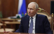Путін