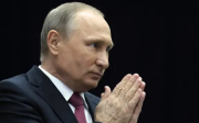 Путін