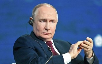 Путін