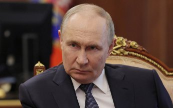 Путін