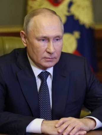 Путін