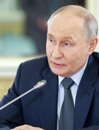 Путін
