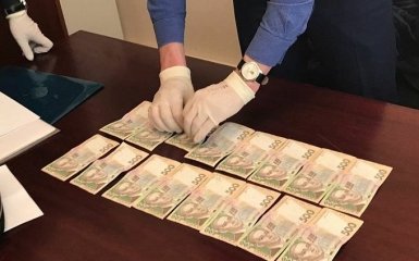 Чиновников из Фонда госимущества в Киевской области поймали на взятке: появились фото
