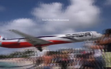 Самолёт идёт на посадку в 10 метрах над головами людей (видео)