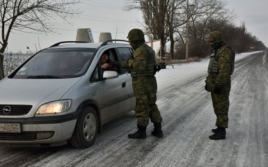На бойовому чергуванні при мінус 20 морозу: блокпости Донеччини (14 фото)
