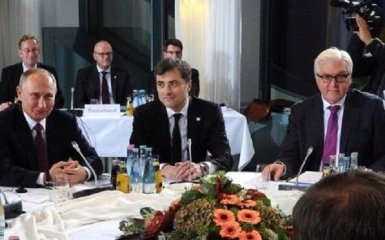 Путин привез в Берлин своего "серого кардинала", которому запрещен въезд в ЕС: появилось фото