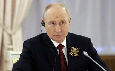 Путин