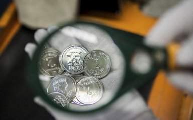 В Украине введены в оборот новые монеты номиналом 1 и 2 гривны