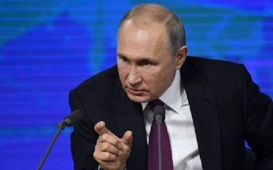 Це потрібно побачити: Time на обкладинці зобразив Путіна, який підноситься над Землею