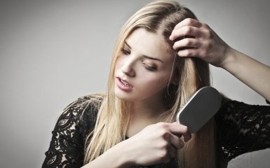 Як зупинити випадіння волосся?