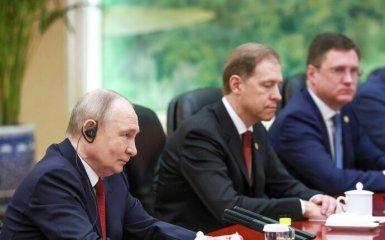 Путин