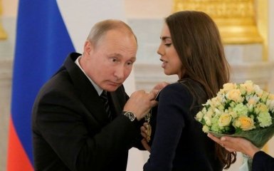 Путін шокував поглядом, торкаючись до грудей чемпіонки: опубліковано фото