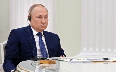 Путин