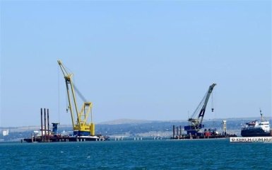 Робочу силу для будівництва путінського моста в Крим знайшли на окупованому Донбасі