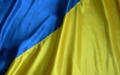 Харьковский чиновник оскорбил флаг Украины: появились фото