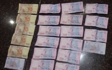Полицейский в Днепре вымогал деньги у школьника: появились фото и видео