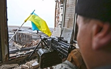 На Донбассе мы поднимали флаг под обстрелами, и делали это с одной целью - боец АТО