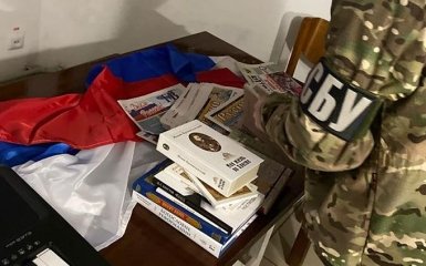 В об'єктах УПЦ МП знайшли брошури ОПЗЖ, склади окупантів та прапори РФ — фото