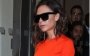 Вікторія Бекхем похизувалась яскраво-помаранчевою сукнею після бурхливої ​​вечірки: з'явилися фото